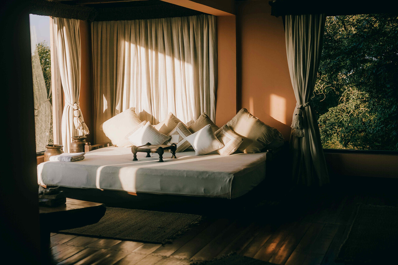 The Sanctuary Suite with private garden and daybed overlooking the hills