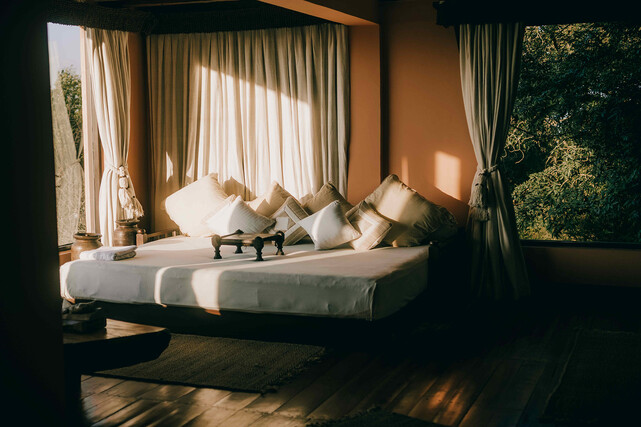 The Sanctuary Suite with private garden and daybed overlooking the hills