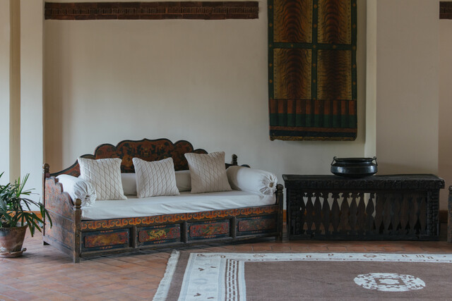 The hallways themselves are part of the collection - antique furniture and paintings gathered by the family over generations.
