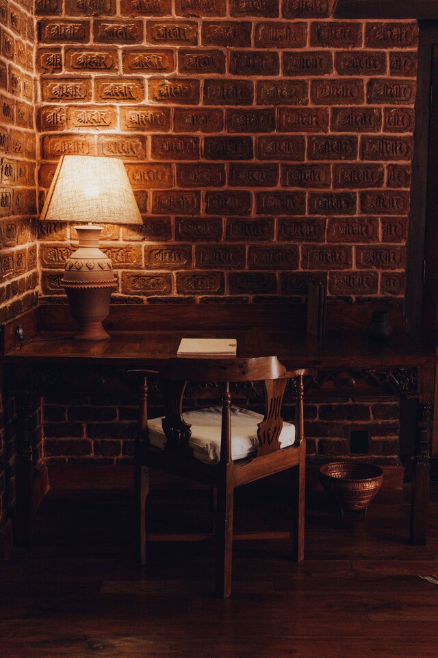 The walls carry history &mdash; bricks stamped with the names of ministers of the Rana dynasty. Fired 141 years ago, they were salvaged and set into these rooms, reminding of an era when Kathmandu was being remade.